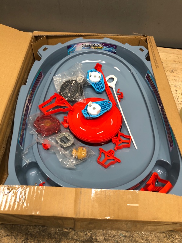 Photo 2 of BEYBLADE Burst Surge Speedstorm Motor Strike Battle Set -- Battle Game playset with Motorized Stadium, 2 Battling Top Toys and 2 Launchers