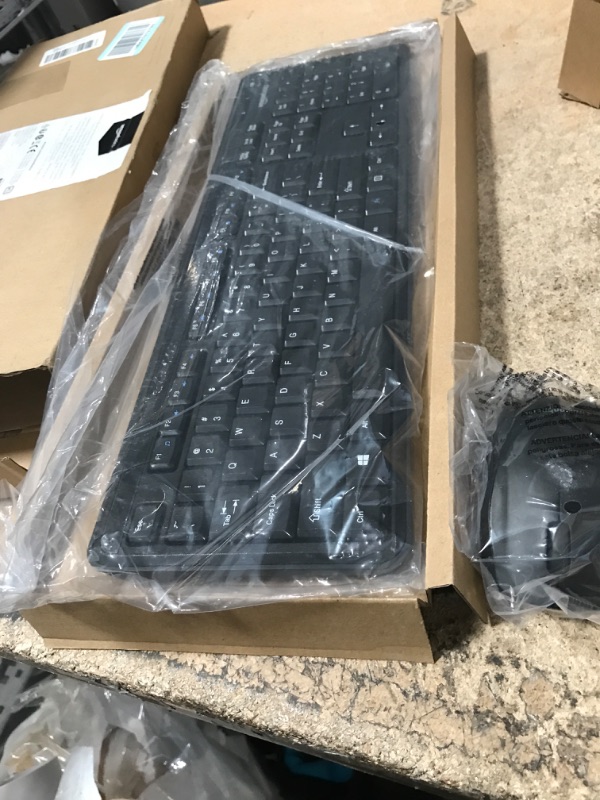 Photo 1 of Amazon Basics Wireless Computer Keyboard and Mouse Combo - Full Size - US Layout (QWERTY) & Gel Computer Mouse Pad with Wrist Support Rest