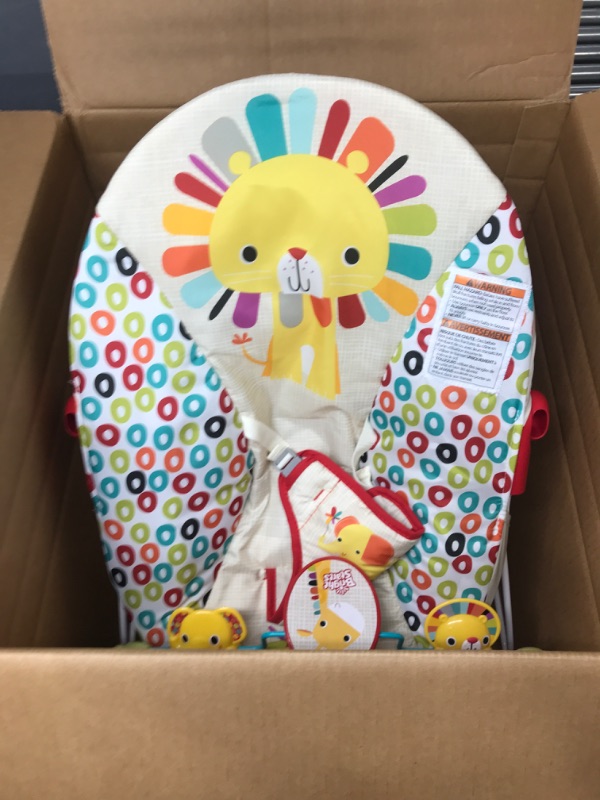 Photo 1 of Bright Starts Playful Pinwheels Portable Baby Bouncer with Vibrating Infant Seat and-Toy Bar, 19.8x13.1x3.4 Inch, Age 0-6 Months