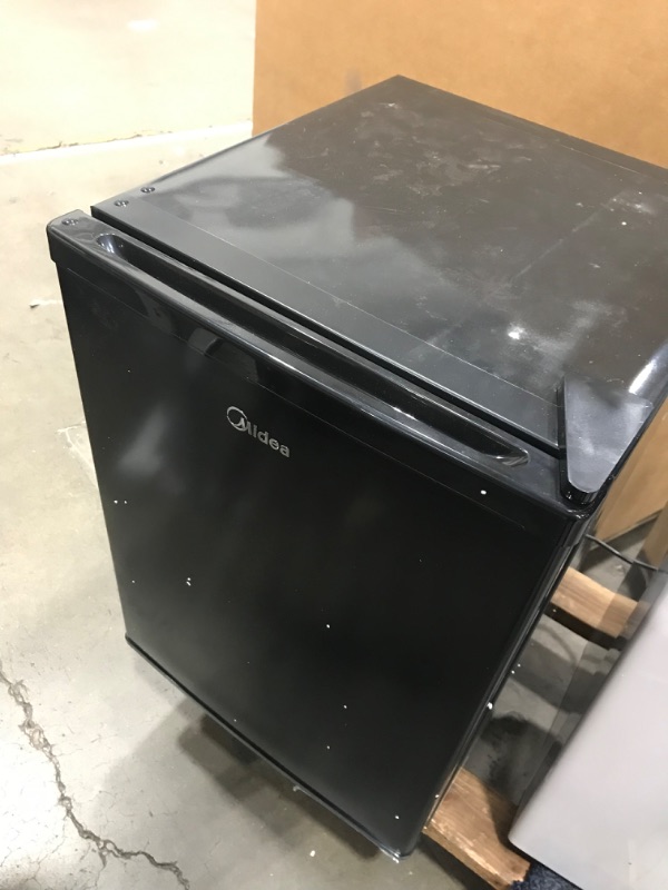 Photo 2 of **NOT FUNCTIONAL !! Midea WHS-65LB1 Compact Single Reversible Door Refrigerator, 1.6 Cubic Feet(0.045 Cubic Meter), Black
