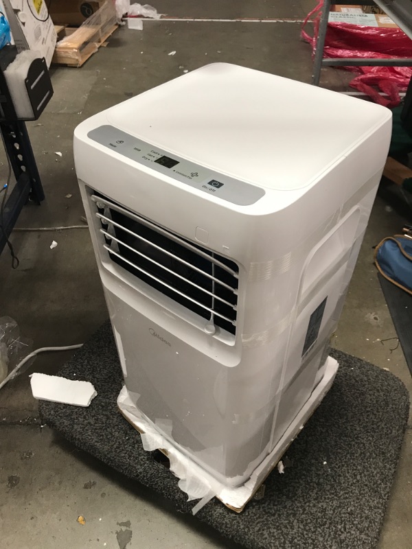 Photo 2 of Midea 8,000 BTU ASHRAE (5,300 BTU SACC) Portable Air Conditioner, Cools up to 175 Sq. Ft., with Dehumidifier & Fan mode, Easy- to-use Remote Control...
