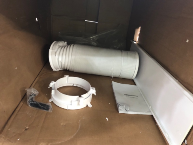 Photo 2 of ***DAMAGED HOSE - SEE NOTES***
Amazon Basics Portable Air Conditioner With Heat Pump, Cools 550 Square Feet, 13,000 BTU ASHARE / 10,000 BTU SACC, White 10,000 BTU Single Hose with Heat Pump