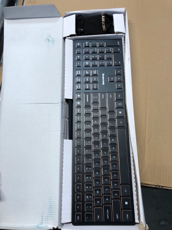 Photo 2 of CHERRY DW 9100 Slim Wireless Keyboard and Mouse Set Combo Rechargeable with SX Scissor Mechanism, Silent keystroke Quiet Typing with Thin Design for Work or Home Office. (Black & Bronze)