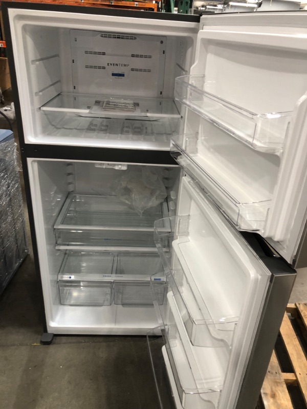 Photo 4 of ***Parts Only***DENTED DOOR**Frigidaire Garage-Ready 20-cu ft Top-Freezer Refrigerator (Fingerprint Resistant Stainless Steel)
