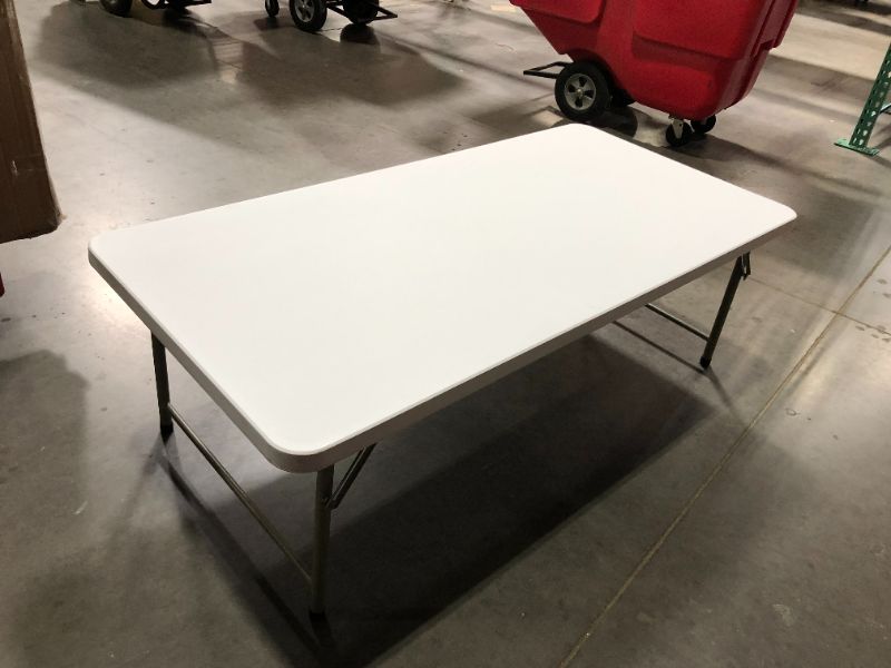 Photo 2 of ***DAMAGED SURFACES - SEE PICTURES***
Flash Furniture 4.93-Foot Kid's Granite White Plastic Folding Table, 19 Inches Tall