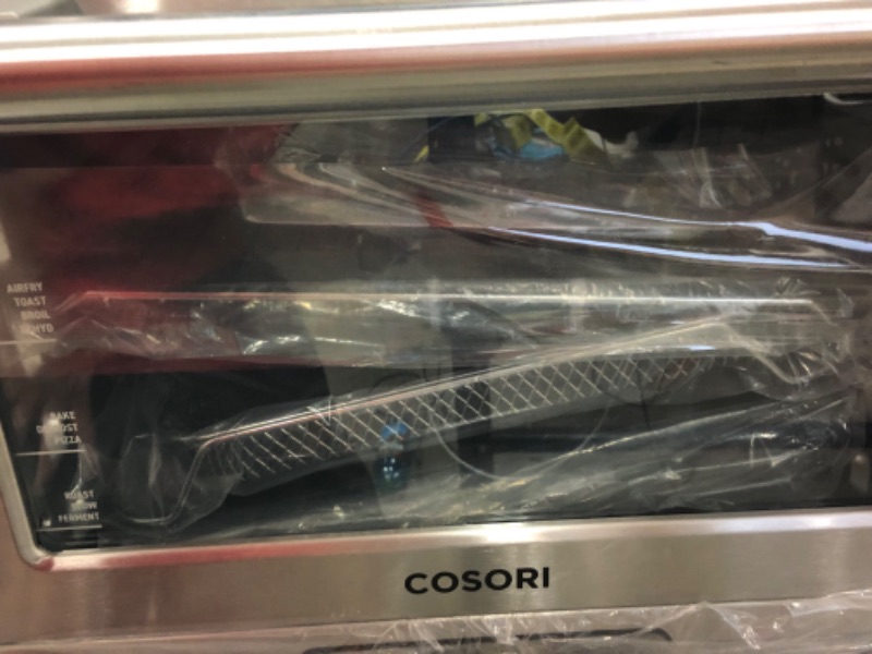 Photo 1 of *MAJOR DAMAGE BUT TURNS ON* COSORI Toaster Oven Air Fryer Combo, 12-in-1, 26QT Convection Oven Countertop, Stainless Steel with Toast Bake and Broil, Smart, 6 Slice Toast, 12'' Pizza, 75 Recipes&Accessories
