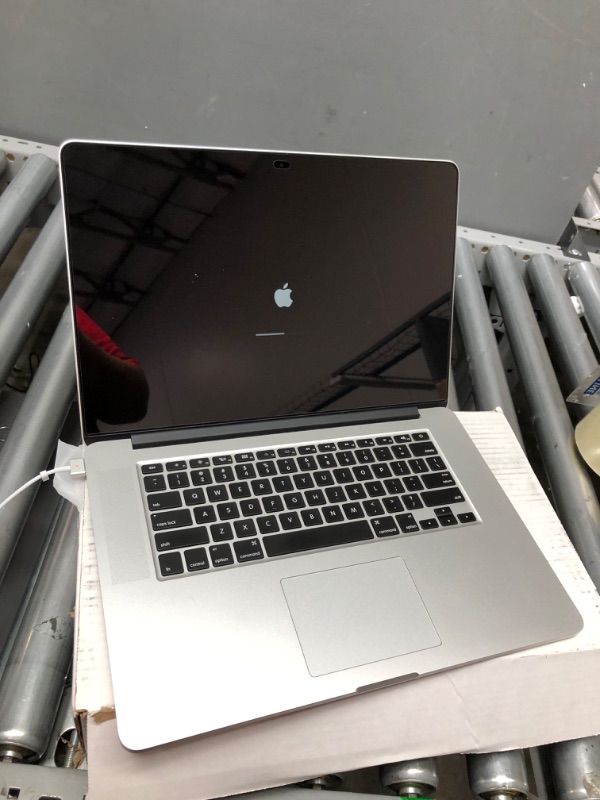 Photo 6 of Mid 2015 Apple MacBook Pro with 2.8GHz Intel Core i7 Processor (15 inch, 16GB RAM, 512GB SSD) Silver 
