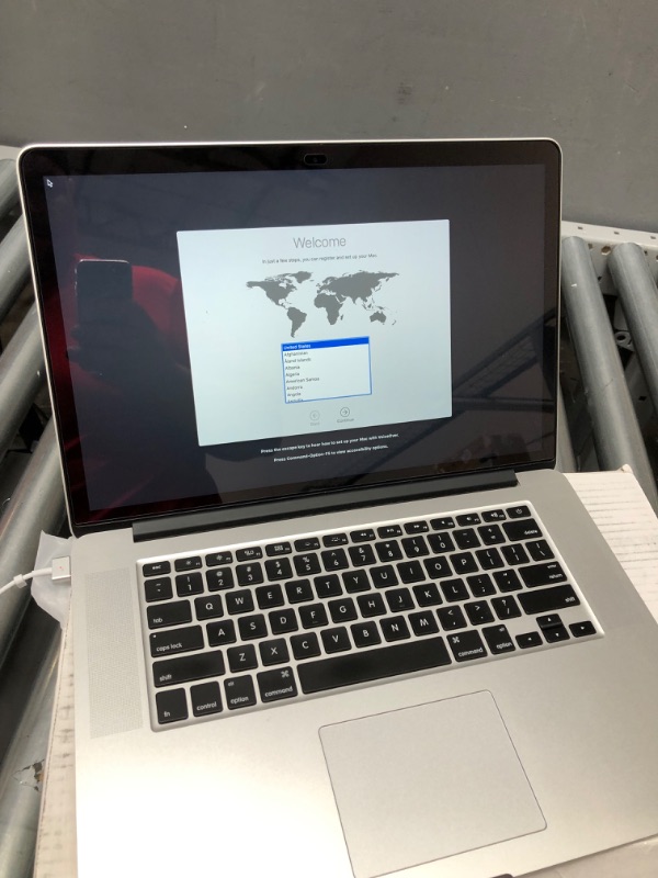 Photo 2 of Mid 2015 Apple MacBook Pro with 2.8GHz Intel Core i7 Processor (15 inch, 16GB RAM, 512GB SSD) Silver 
