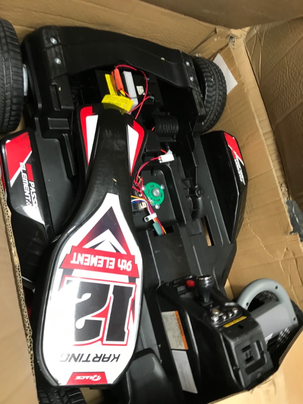 Photo 5 of * item incomplete * missing seat other parts * 
ELEMARA Electric Go Kart for Kids, 12V 2WD Battery Powered Ride On Cars with Parent Remote Control for Boys Girls,