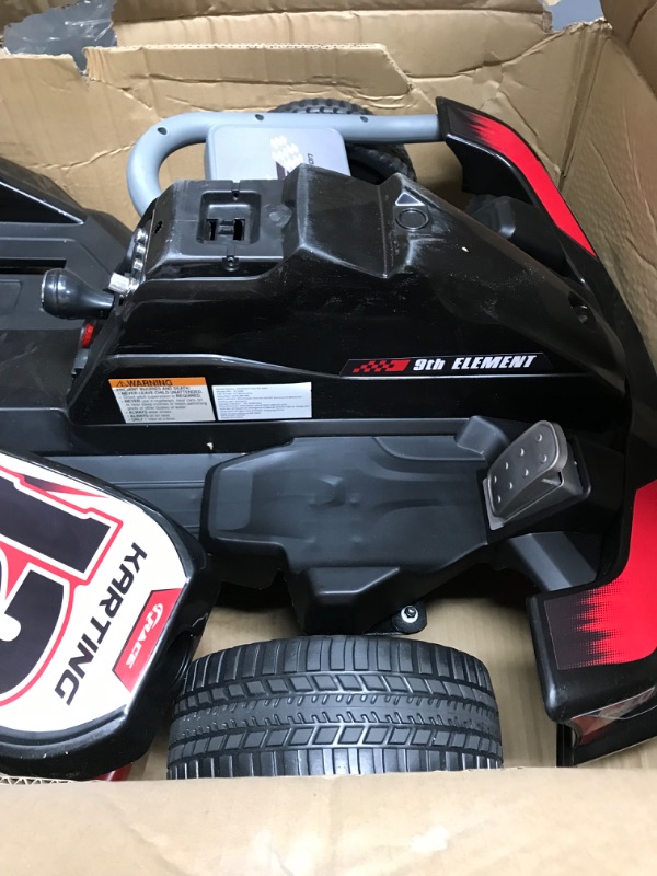 Photo 4 of * item incomplete * missing seat other parts * 
ELEMARA Electric Go Kart for Kids, 12V 2WD Battery Powered Ride On Cars with Parent Remote Control for Boys Girls,
