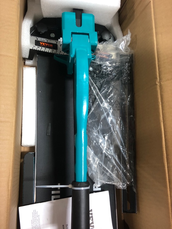 Photo 1 of VEVOR Tile Cutter 31.5 Inch Manual Tile Cutter 1.4 Inch Tile Cutting Machine Ceramic Porcelain Tile Cutter w/Laser Guide All-Steel Frame and Bonus Spare Cutter Wheels Tile Cutter Hand Tool