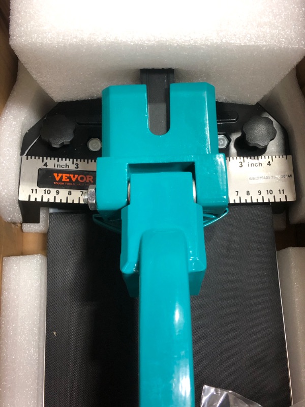 Photo 1 of VEVOR Tile Cutter 31.5 Inch Manual Tile Cutter 1.4 Inch Tile Cutting Machine Ceramic Porcelain Tile Cutter w/Laser Guide All-Steel Frame and Bonus Spare Cutter Wheels Tile Cutter Hand Tool