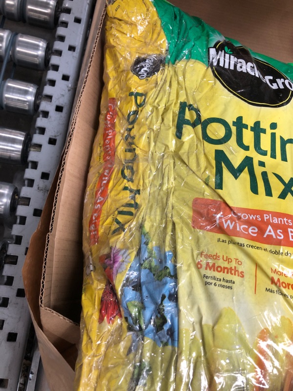 Photo 3 of *accidentally cut down the side of bag, bag has been tapped up* Miracle-Gro Potting Mix 1 cu. ft. 1 cu. ft. Single Pack