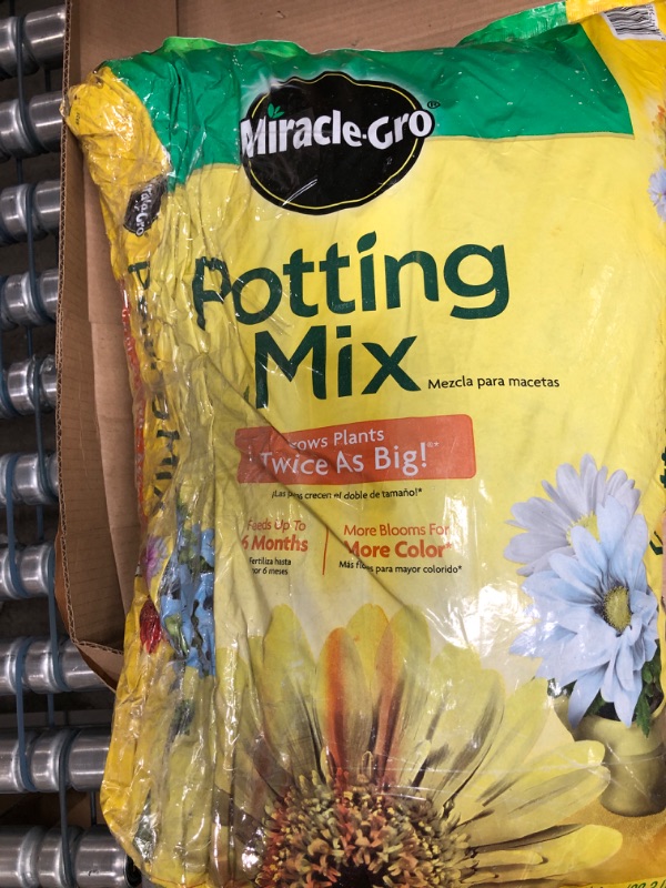 Photo 2 of *accidentally cut down the side of bag, bag has been tapped up* Miracle-Gro Potting Mix 1 cu. ft. 1 cu. ft. Single Pack