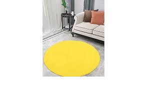 Photo 1 of 35" yellow round rug