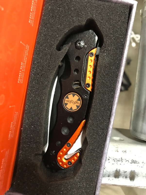 Photo 2 of 3-in-1 EMT / EMS Tactical Knife for First Responders with Window Glass Breaker, Seatbelt Cutter and Steel Serrated Blade
