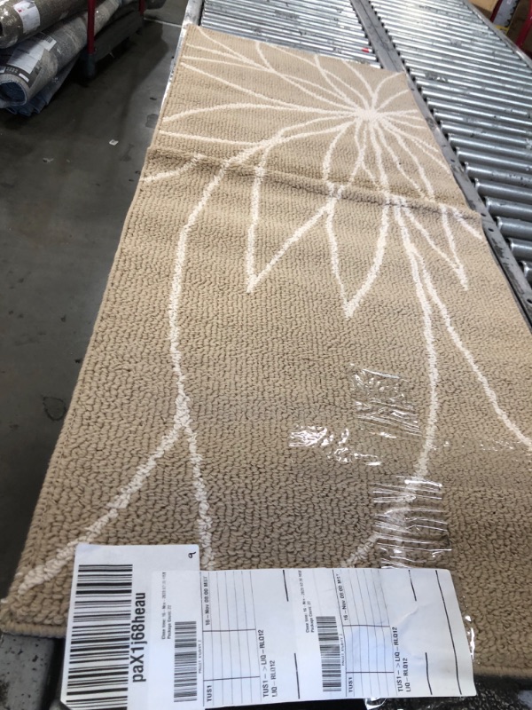 Photo 1 of 2' x 5' light brown/ white runner rug 