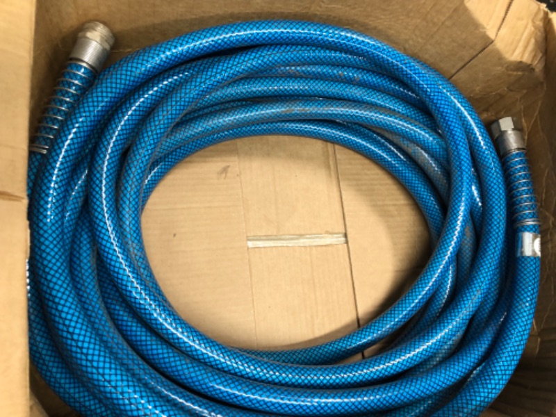 Photo 2 of 
Camco TastePURE 50-Foot Premium Drinking Water Hose | Features a Heavy-Duty Reinforced PVC Construction, Machined Fittings with Strain Relief Ends, and has...