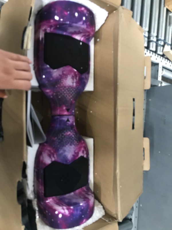 Photo 2 of *DAMAGED*
Hover-1 Helix Electric Hoverboard | 7MPH Top Speed, 4 Mile Range, 6HR Full-Charge, Built-in Bluetooth Speaker, Rider Modes: Beginner to Expert Hoverboard Galaxy