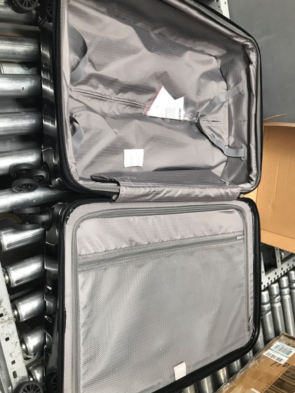 Photo 1 of DELSEY Paris Helium Aero Hardside Expandable Luggage with Spinner Wheels, Black, Checked-Medium 25 Inch Checked-Medium 25 Inch Black