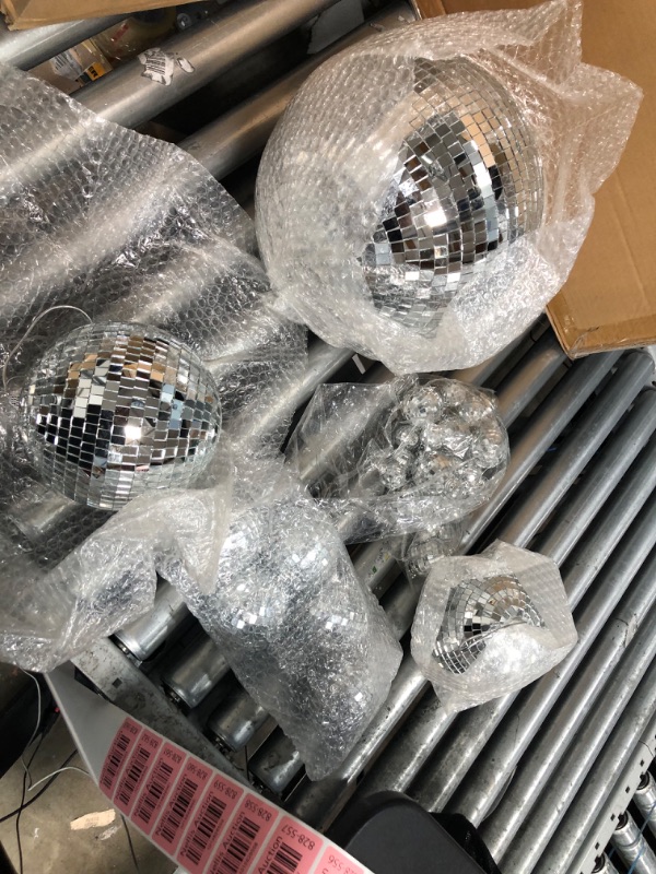 Photo 2 of **MINOR WEAR & TEAR**40 Pack Mirror Disco Ball in Variety Silver Hanging Glass Mirror Ball Light Ball with String Disco Hanging Ornament for Club Stage Bar Birthday 70s Party Decoration (10/ 6/ 3/ 2/ 1.2 Inch)