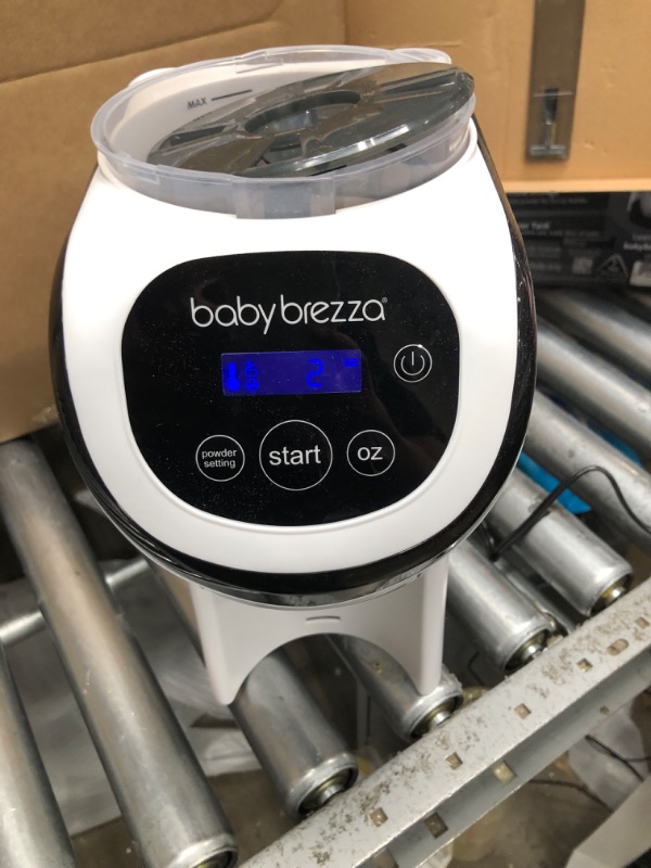 Photo 4 of Baby Brezza Formula Pro Mini Baby Formula Maker – Small Baby Formula Mixer Machine Fits Small Spaces and is Portable for Travel– Bottle Makers Makes The Perfect Bottle for Your Infant On The Go Formula Pro Mini Dispenser Machine