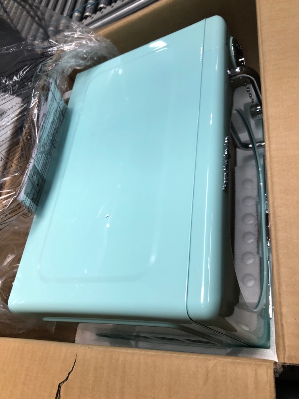 Photo 1 of *powers on but doesn't heat food* Nostalgia Retro Compact Countertop Microwave Oven, 0.7 Cu. Ft. 700-Watts with LED Digital Display, Child Lock, Easy Clean Interior, Aqua Aqua Microwave