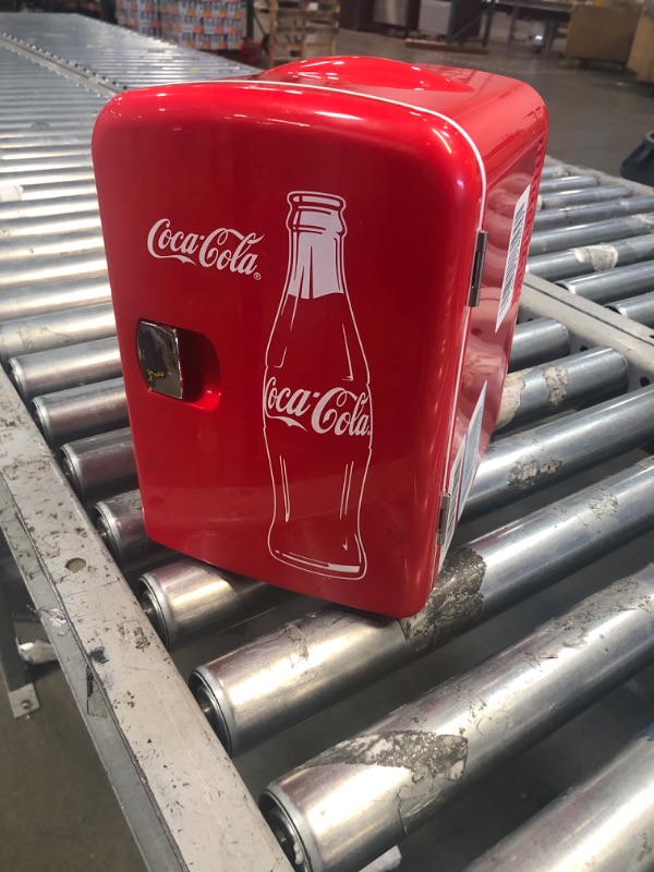 Photo 2 of Coca-Cola Classic Coke Bottle 4L Mini Fridge w/ 12V DC and 110V AC Cords, 6 Can Portable Cooler, Personal Travel Refrigerator for Snacks Lunch Drinks Cosmetics, Desk Home Office Dorm, Red
