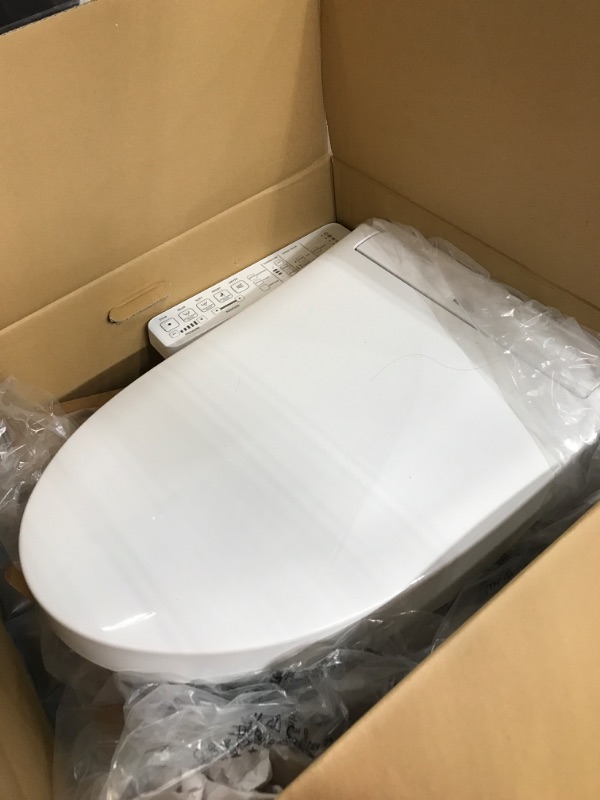 Photo 2 of ***NONFUNCTIONAL - FOR PARTS - SEE NOTES***
TOTO SW3074#01 WASHLET C2 Electronic Bidet Toilet Seat with PREMIST and EWATER+ Wand Cleaning