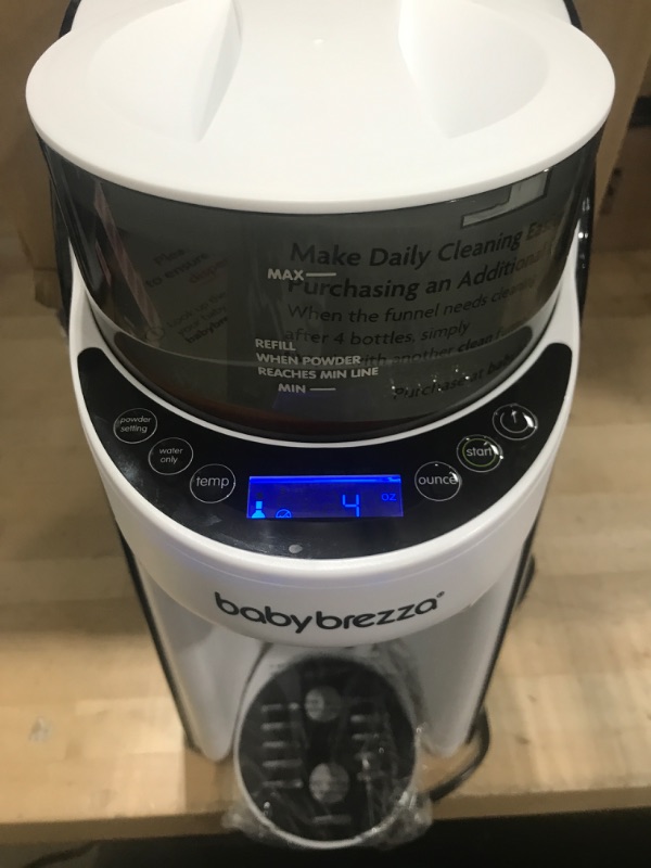 Photo 2 of ***POWERS ON*** New and Improved Baby Brezza Formula Pro Advanced Formula Dispenser Machine - Automatically Mix a Warm Formula Bottle Instantly - Easily Make Bottle with Automatic Powder Blending