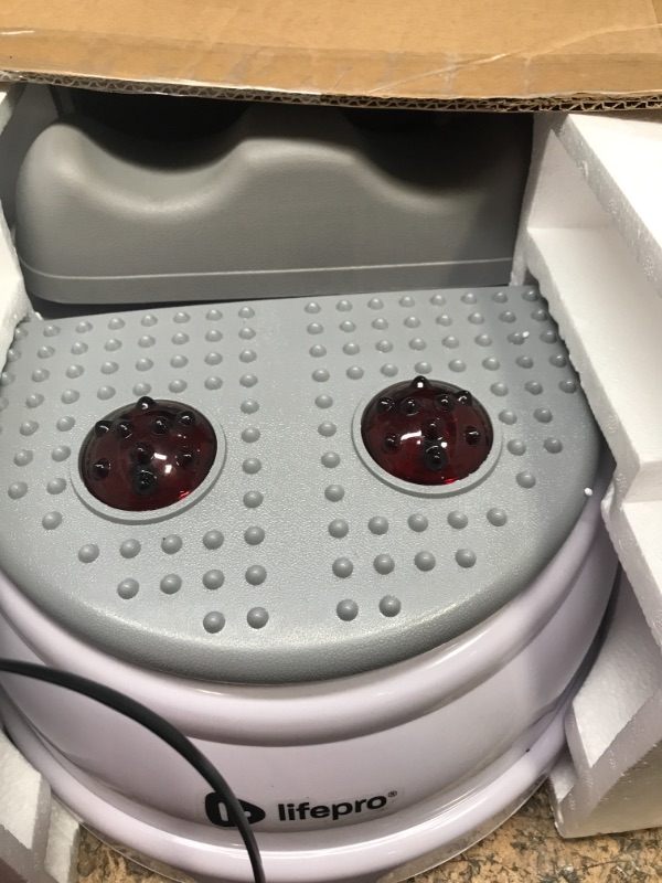 Photo 1 of LifePro Chi Machine - Chi Swing Machine for Passive Aerobic Leg Exercises - Exercise While Sitting or Laying Down with The MediRipple Leg Shaker.