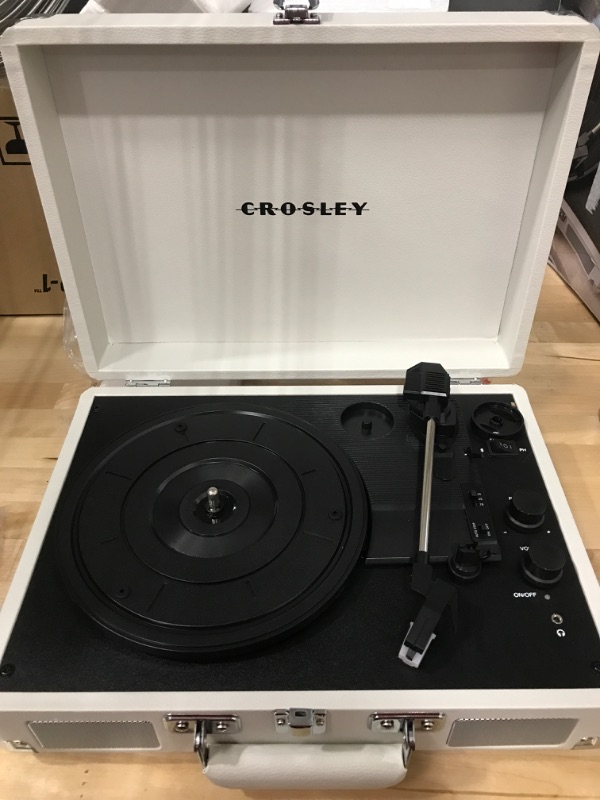 Photo 1 of POWERS ON *** Crosley CR8005F-WS Cruiser Plus Vintage 3-Speed Bluetooth in/Out Suitcase Vinyl Record Player Turntable, White Sand Bluetooth In/Out White Sand