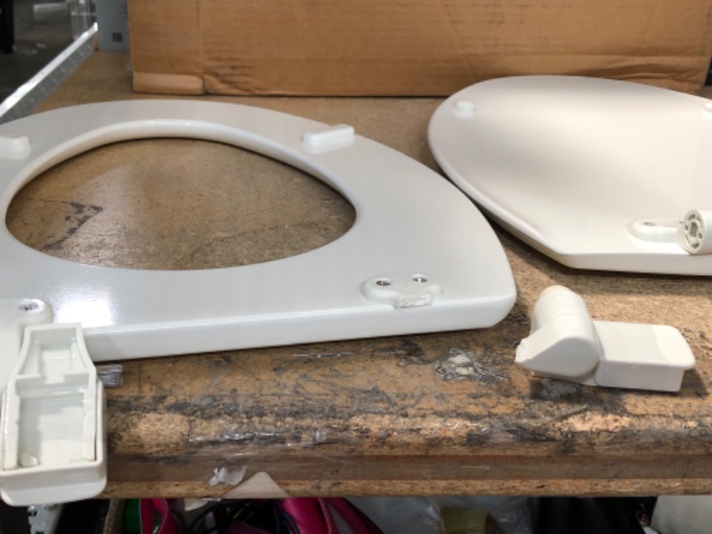 Photo 3 of **DAMAGE**
***PARTS ONLY***
Mayfair 1847SLOW 000 Kendall Slow-Close, Removable Enameled Wood Toilet Seat That Will Never Loosen, 1 Pack ELONGATED - Premium Hinge, White White ELONGATED Toilet Seat