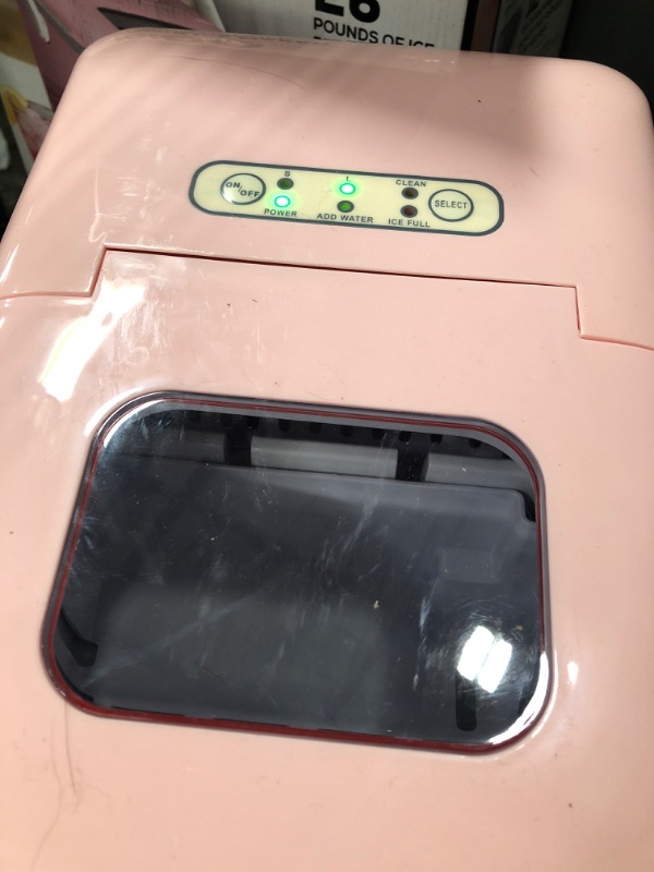 Photo 2 of **USED**
Igloo 26-Pound Automatic Self-Cleaning Portable Countertop Ice Maker Machine with Handle, Pink Pink Ice Maker
**MISSING SCOOP**