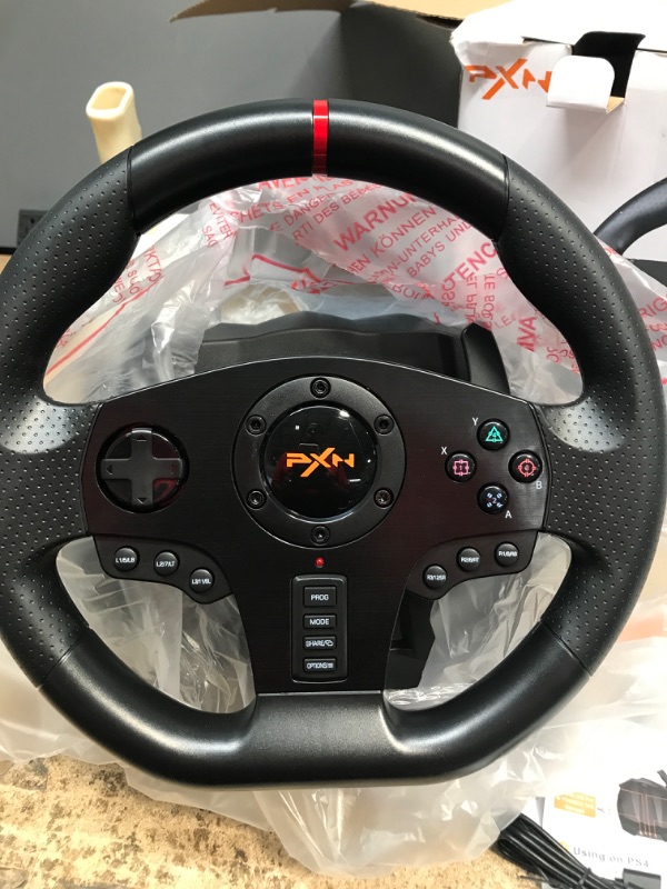 Photo 2 of Gaming Racing Wheel, PXN V900 270/900 Degree Competition Racing Steering Wheel with Audio Function & with Pedal, Suitable for PC, PS3, PS4, Xbox One, Xbox Series S/X, Nintendo Switch. Black