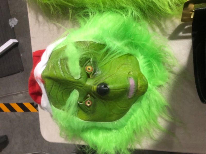 Photo 6 of **NONREFUNDABLE**DAMAGED**FOR PARTS OR REPAIR**
Afoxsos Christmas Green Monster Costume Mask is a bit torn - 7PCS Adult Santa Suit Set Santa Claus Outfit (Including Mask) X-Large Furry