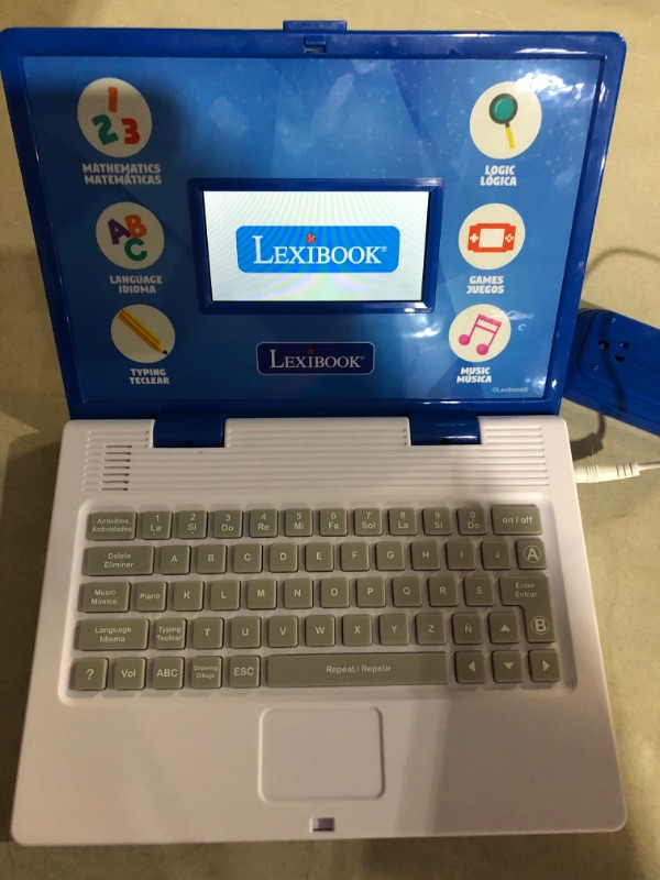 Photo 2 of **NEEDS NEW BATTERIES **
Lexibook bilingual educational laptop 130 activities (English/Spanish)