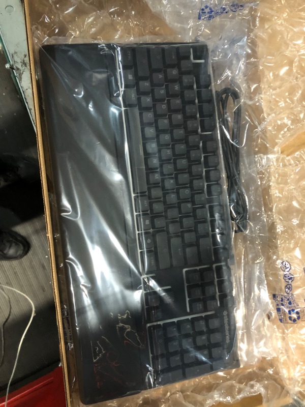 Photo 2 of SteelSeries Apex 3 RGB Gaming Keyboard – 10-Zone RGB Illumination – IP32 Water Resistant – Premium Magnetic Wrist Rest (Whisper Quiet Gaming Switch) (Renewed)