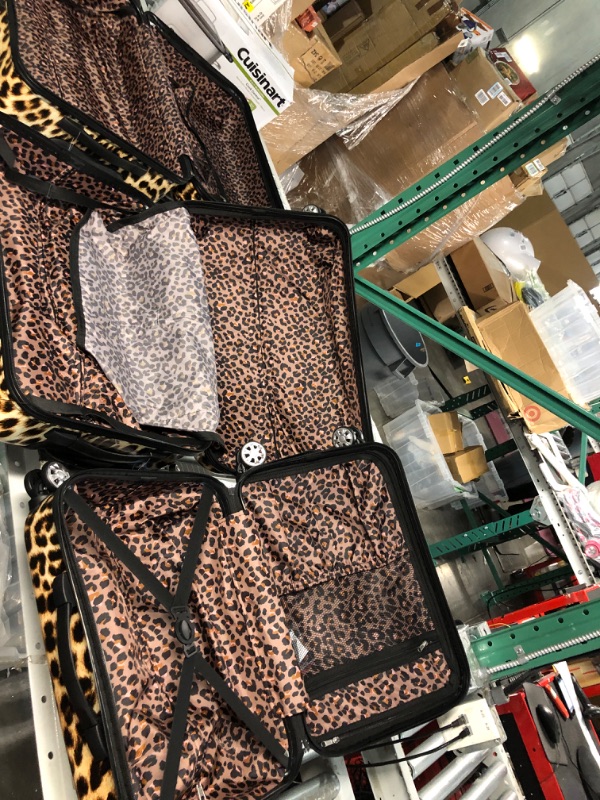 Photo 1 of **DAMAGE SEE PICTURES** Rockland Safari Hardside Spinner Wheel Luggage, Leopard, 3-Piece Set (Leopard)