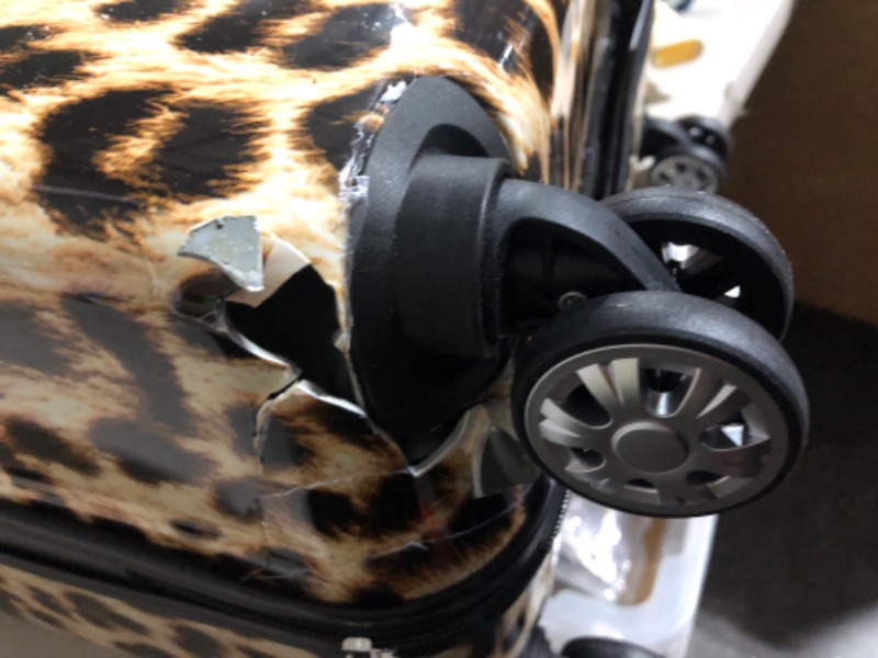 Photo 5 of **DAMAGE SEE PICTURES** Rockland Safari Hardside Spinner Wheel Luggage, Leopard, 3-Piece Set (Leopard)