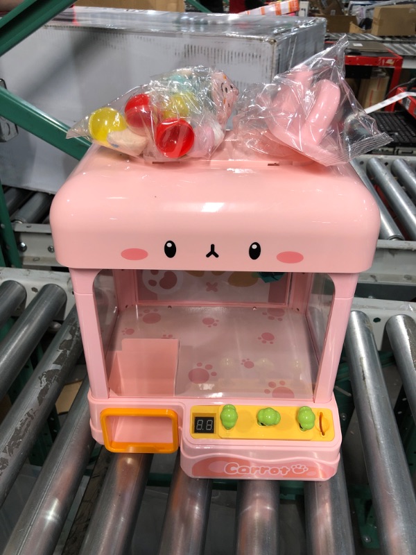 Photo 2 of cxjoigxi Mini Claw Machine for Kids Adults with Prizes,Volume Control