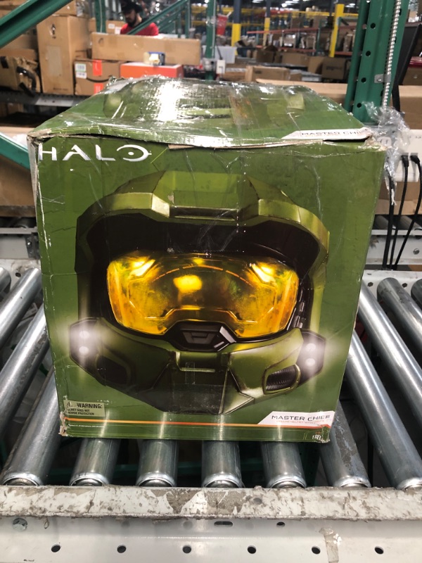 Photo 2 of **SEE NOTES**
HALO Master Chief Deluxe Helmet with Stand - LED Lights on Each Side - Battle Damaged Paint - One Size Fits Most (Green)