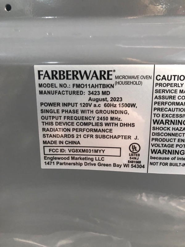 Photo 1 of Farberware Classic FMO11AHTBKN 1.1 Cu. Ft. 1000-Watt Microwave Oven with LED Lighting, Metallic Red