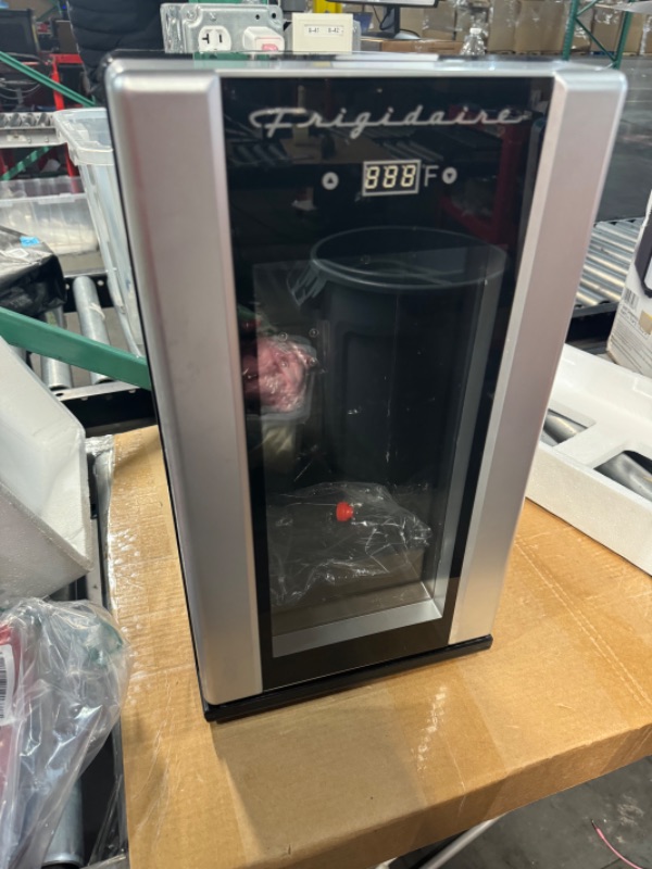 Photo 1 of **NONREFUNDABLE**FOR PARTS OR REPAIR**SEE NOTES**
FRIGIDAIRE EFMIS567_AMZ 18 Can OR 4 Wine Bottle Retro Beverage Fridge, Temperature Control, Thermoelectric, FreonFree, Stainless
