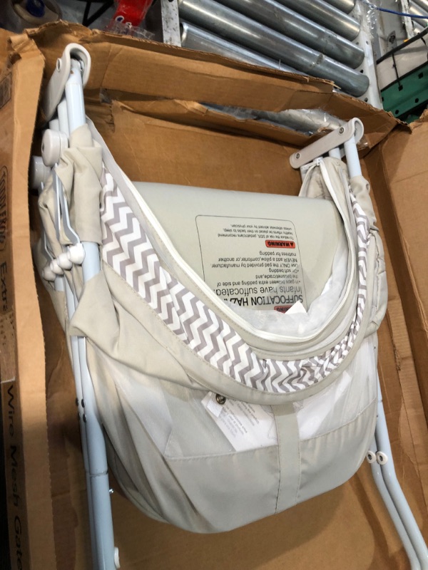 Photo 1 of Dream On Me Karley Bassinet in Grey, Lightweight Portable Baby Bassinet, Quick Fold and Easy to Carry , Adjustable Double Canopy, Indoor and Outdoor Bassinet with Large Storage Basket.
