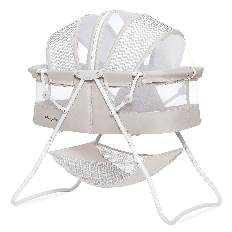 Photo 1 of Dream On Me Karley Bassinet in Grey, Lightweight Portable Baby Bassinet, Quick Fold and Easy to Carry , Adjustable Double Canopy, Indoor and Outdoor Bassinet with Large Storage Basket.
