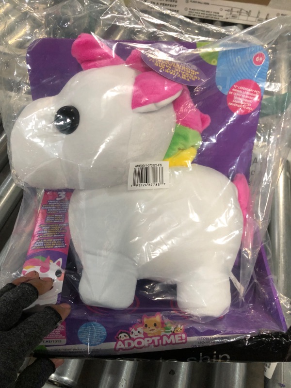 Photo 4 of Adopt Me! Neon Unicorn 12-Inch Light-Up Plush - Soft and Cuddly - Three Light-Up Modes - Directly from The #1 Game, Toys for Kids - Ages 6+