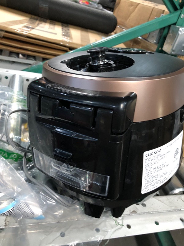 Photo 2 of **USED/DIRTY**
CUCKOO CRP-P0609S | 6-Cup (Uncooked) Pressure Rice Cooker- Black/Copper