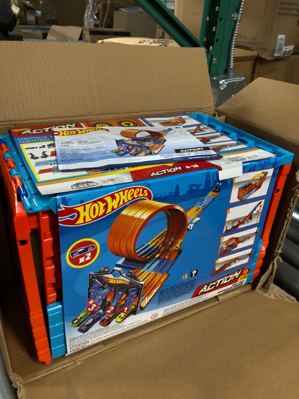 Photo 2 of ?€?Hot Wheels Race Crate with 3 Stunts in 1 Set Portable Storage Ages 6 to 10 [Amazon Exclusive] & Set Of 10 1:64 Scale Toy Trucks And Cars For Kids And Collectors (Styles May Vary) [Amazon Exclusive] Race Tracks + Hot Wheels Set Of 10