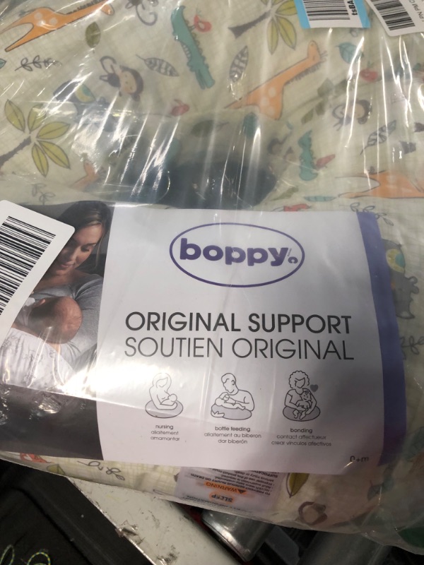 Photo 2 of Boppy Nursing Pillow Original Support, Jungle Beat, Ergonomic Nursing Essentials for Bottle and Breastfeeding, Firm Fiber Fill, with Removable Nursing Pillow Cover, Machine Washable